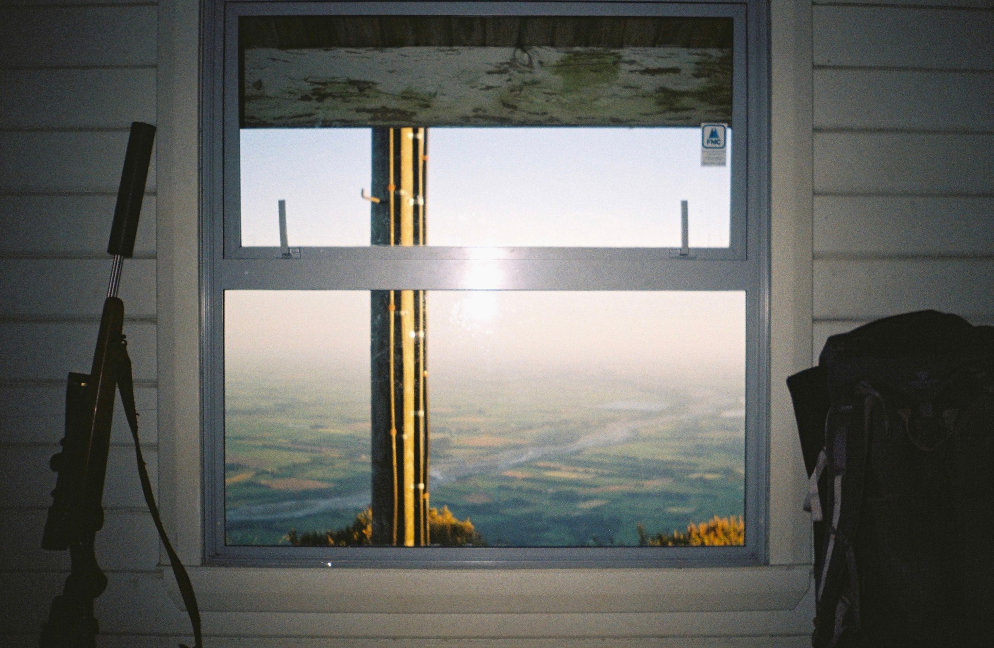 Window View Landscape Rifle Jacket Wall White Blue Sky Sunlight Reflection Frame Glass Horizon